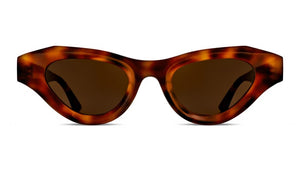Explore our Jaya Sunglasses collection by Thierry Lasry, showcasing broad, angular tortoiseshell-patterned frames with dark lenses that reflect the elegance of Thierry Lasry and the bold style of Cult Gaia.