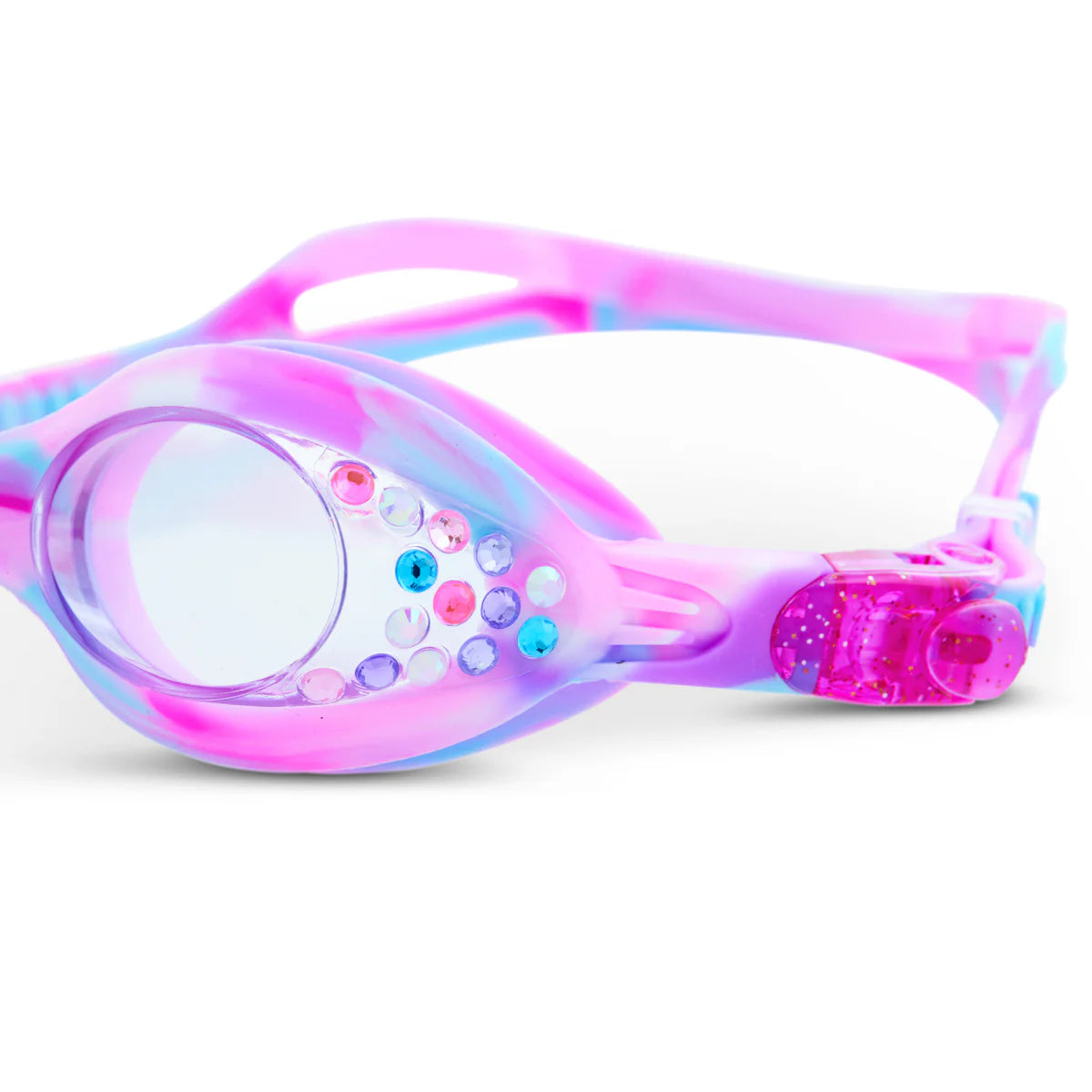 A close-up of Bling2O Tiny Taffy Swim Goggles for kids in pink, purple, and blue, featuring small faux gemstones on the frame.