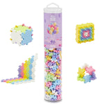 The Plus Plus Tube - 240 Piece - Pastel Mix features colorful pastel blocks assembled into fun shapes like a cube, square, arch, and wave—ideal for creative play and building fine motor skills with this engaging STEM toy.
