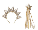 The Noralee Sun Crown + Wand set, featuring a gold sequin sun crown headband with star points and a matching gold star wand with ribbons, is perfect for royal occasions and displayed on a white background.