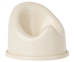 The Maileg Off-White Potty, Micro is a plastic potty seat for toddlers and micro babies, featuring a high backrest and rounded front for comfort—ideal for toilet training or as an accessory in any Maileg collection.