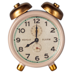 The Maileg Alarm Clock, Mouse - Powder, a beige analog clock with gold bells and meticulous details, shows the time as 10:11.