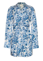The Juni Shirt Dress by Cara Cara is a blue and white floral dress with cuffed long sleeves and a gathered waist, adding elegance to any occasion.