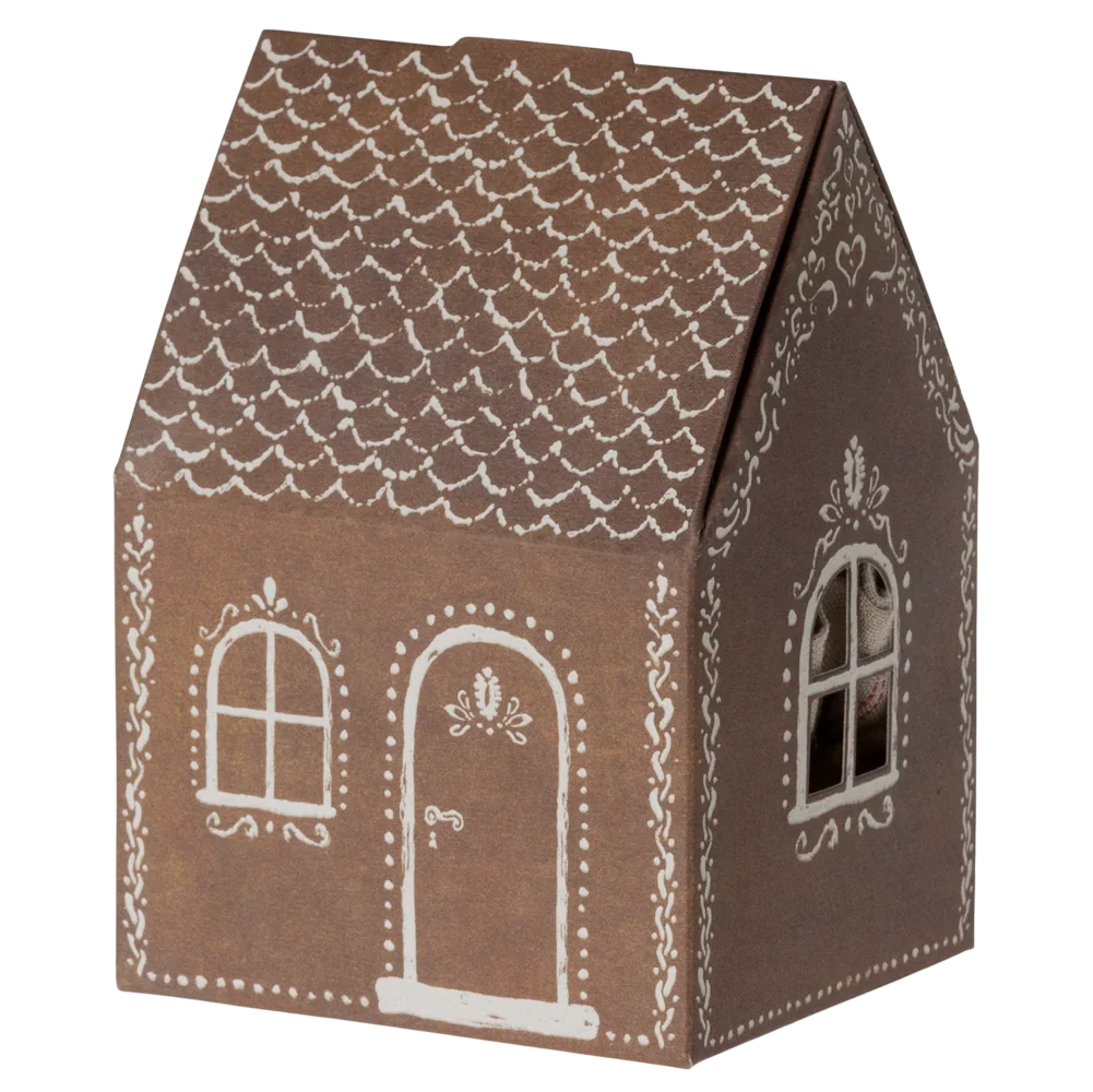 A small, brown, house-shaped box by Maileg called "Santa Mouse," features white decorative patterns, a door, and windows resembling a gingerbread house.