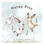 The board book "Hares Play - A Counting Book" by Bunnies By the Bay has an illustrated cover with three playful rabbits and numbers 1, 2, and 3, perfect for baby's learning.