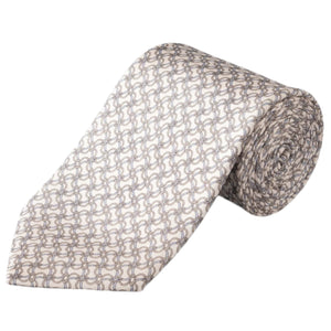 The Eton Off White Geometric Link Tie features a beige and gray geometric pattern on a white background, offering classic elegance and sartorial flair to any ensemble.