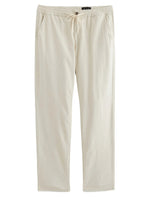 The Tate Drawstring Pant by AG Jeans features twill linen khaki fabric, a relaxed drawstring waistband, and side pockets, shown here laid flat on a white background.