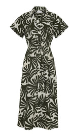 The Asbury Midi Dress by Cara Cara features short sleeves, a button-down front, black and white leaf print, collar, and self-tie waist—making this stylish shirt dress an effortless must-have.