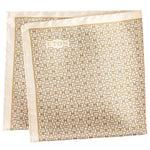 The Eton Geometric Silk Pocket Square features a folded cream and gold geometric print with "ETON" in the corner, made in Italy.