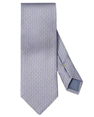 The Eton Geometric Print Silk Tie features a light blue hue with a subtle geometric pattern and a discreet gold tie pin on the back—ideal for elevating classic suiting.