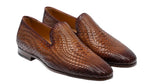 A pair of elegant Herrera Woven Loafers by Magnanni with a smooth finish, hand-woven brown leather, featuring a low heel and slip-on design, displayed against a plain white background.