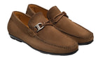 The Monterey Braid Bit Driver Loafer by Magnanni is a brown suede moccasin featuring a braided leather detail and a metal buckle, echoing the style of traditional driving shoes.