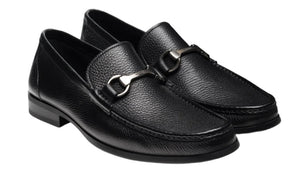 The Gentry Soft Bit Loafer by Magnanni, featuring black leather, a silver metal buckle detail, and a cushioned sole, is showcased on a white background.