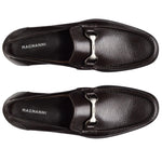 Top view of a pair of Magnanni Gentry Soft Bit Loafers in black leather with silver buckles, placed side by side on a plain white background.