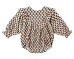 The Baby Girls' Winnie Romper by Rylee & Cru features a bubble silhouette, long sleeves, ruffled shoulders, and an all-over brown floral print on beige, plus bottom snaps for easy changing.