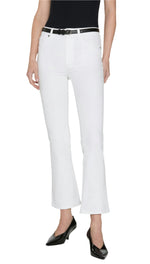 A person wearing a black sleeveless top, black belt, black pointed-toe heels, and FRAME's The Reboot Crop jeans in white with a cropped inseam, shown from shoulders to feet.