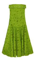 The Imogen Midi Dress by Simkhai is a strapless, knee-length green dress featuring a flared skirt and leaf-like textured pattern in fresh Kiwi Summer Jacquard.