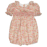 The Kidiwi Baby Girls' Anthea Smocked Romper features puffed sleeves and an embroidered ruffled collar with a red and pink flower print on a light background, crafted from OEKO TEX certified cotton.
