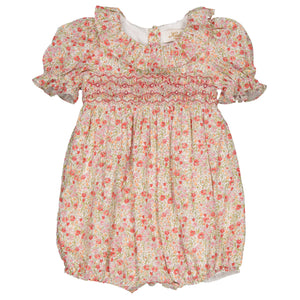 The Kidiwi Baby Girls' Anthea Smocked Romper features puffed sleeves and an embroidered ruffled collar with a red and pink flower print on a light background, crafted from OEKO TEX certified cotton.