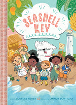 The illustrated book cover for "Seashell Key," a young chapter series by Abrams, is set in a seaside town and features diverse children, a fluffy dog, and a lighthouse with the title displayed in a speech bubble.