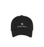 The Jeremy Baseball Cap by Anine Bing in black features a white embroidered logo and "AB ANINE BING" text on the front, plus an adjustable back strap, shown against a plain white background.