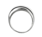 The Anna Ring by Lie Studio is a sterling silver piece featuring an asymmetrical, sculptural dome with a polished finish, ideal for stacking. Shown against a white background.
