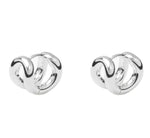 The Asta Earrings by Lie Studio feature a refined silhouette in polished sterling silver, elegantly displayed on a white background.