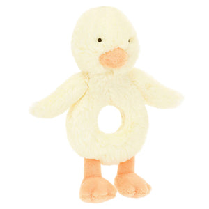 The Jellycat Bashful Duckling Ring Rattle is a plush yellow baby rattle made from recycled fibers, with a circular hole for little hands, orange beak and feet—perfect for infants.