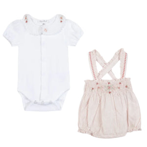 The Baby Girls' Bubble Romper Set by Tartine et Chocolat includes a white bodysuit with an embroidered flower and a beige striped romper with cross-back straps, ruffled collar, and red stitching—perfect for summer days.