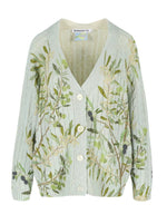 The Zuri Cardigan from Bernadette features a light green cable knit with an Olive Tree leaf and berry print, classic V-neck, and iconic Bernadette buttons, adding charm and elegance to your wardrobe.