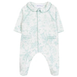 Tartine et Chocolat Baby Girls' Printed Pajamas feature long sleeves, a scalloped collar, two front pockets, and a light green Toile de Jouy-inspired botanical print on soft white fabric.