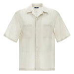 The Summer Linen Camp Shirt by Herno is a short-sleeve, off-white linen button-up with a relaxed fit, two front pockets, and a classic collar. Its yarn-dyed fabric ensures lasting color resistance.