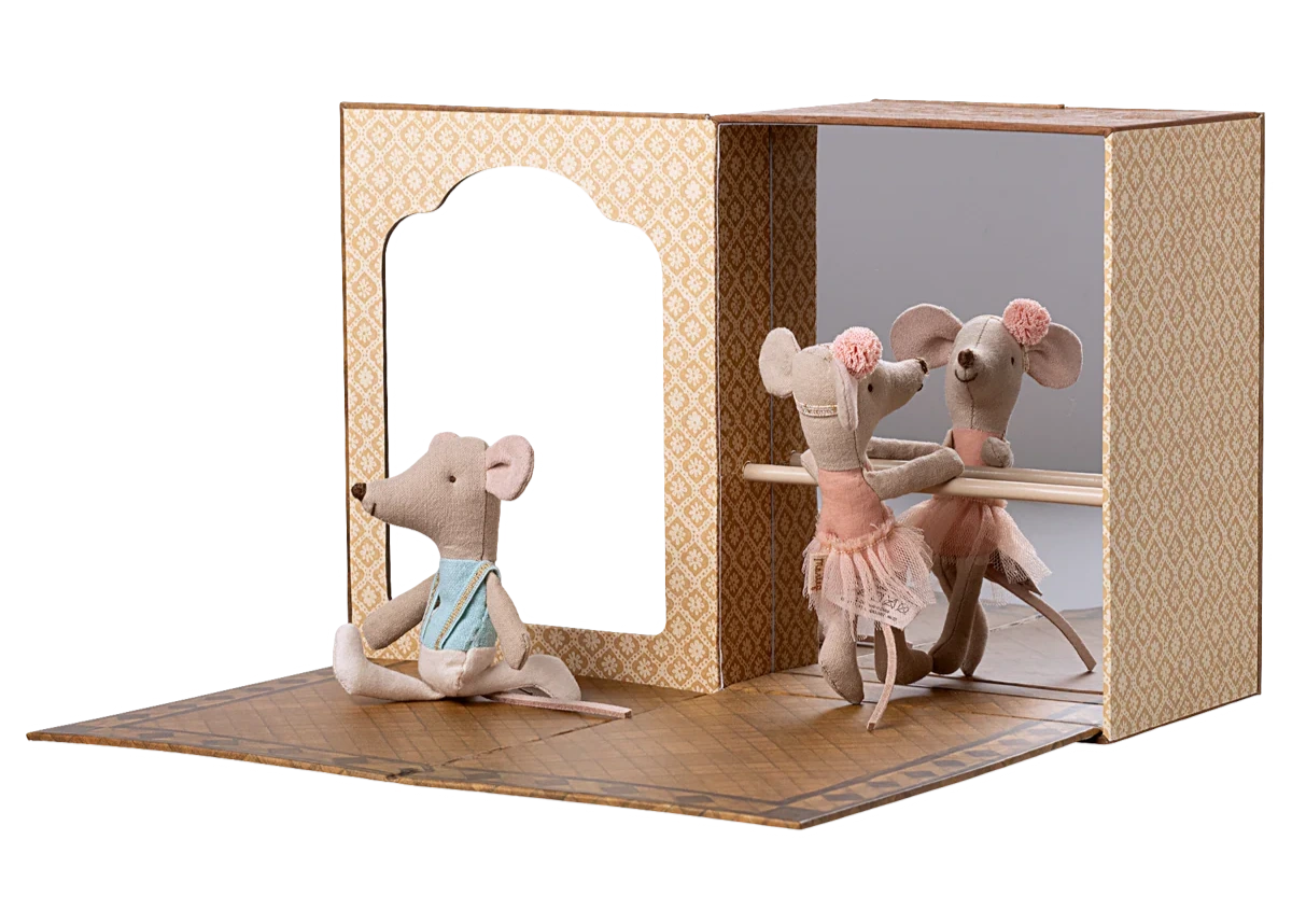 The Maileg Ballet Mice in Dance Studio set features Little Sister in pink and Little Brother in blue, both practicing at the barre with a mirror—an adorable, charming addition to any mouse house.