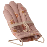 The Maileg Babysitter, My - Rose is a small padded doll chair with a pink floral cover, fabric harness, and beige metal frame—ideal for rabbits or baby mice—shown on a plain white background.