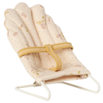 Maileg Babysitter, Micro - Off White: Features a pale pink floral cushion, yellow strap, and white metal frame—ideal for micro-sized rabbits or tiny bunnies. Photographed against a plain background.