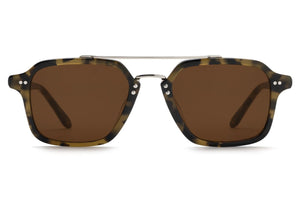 The Colton Tortuga Silver Sunglasses by Krewe feature a square tortoiseshell frame, brown lenses, and a sleek brow bar for effortless style.