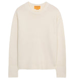 The Cozy Crew Cashmere Sweater by Guest in Residence features long sleeves, an off-white knit design, a cozy crew neckline, and ribbed neck trim, displayed on a white background.