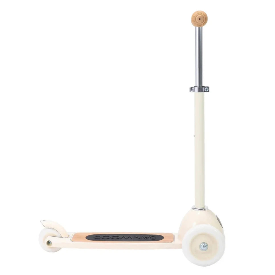 The Banwood cream-colored toy Scooter features a wooden base, two white wheels, and an adjustable handlebar with a comfortable rubber grip, ideal for enhancing balance and fine motor skills.