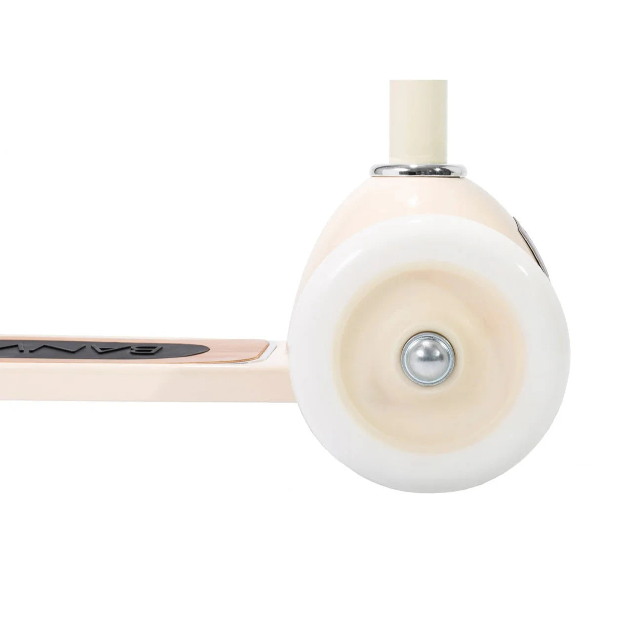 A close-up of Banwood's Scooter shows a light pink wheel with a white rim, attached to its beige base. Ideal for developing fine motor skills and balance, this charming design embodies playful exploration.