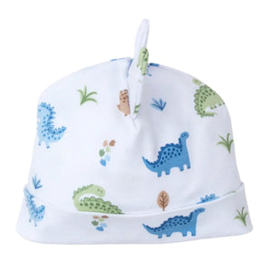 The Kissy Kissy Baby Dinosaur Novelty Hat is made from soft Pima cotton and features a cute top knot with a playful blue, green, and brown dinosaur pattern.