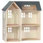 The Maileg Dollhouse, House of Miniature with Wallpaper, is a charming two-floor wooden dollhouse featuring a gray roof and patterned wallpaper, perfect for the Teddy family or Bunny/Rabbit characters.