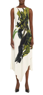 A person in a Jason Wu Collection Boatneck Fit and Flare Crepe Dress with a green and black brushstroke print, wearing black heels.