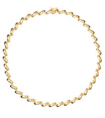The Edith Necklace by Lie Studio features curve-shaped, interlocking links arranged in a circular design on a white background.