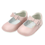 A pair of L'Amour Shoes' Baby Girls' Ava Bow Mary Jane, crafted from soft waxed leather in pink, featuring bows and strap closures, on a white background.