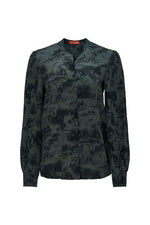 The Altuzarra Patsy Top is a dark green blouse with an abstract pattern, buttoned front, long sleeves, and elegant bishop sleeves.