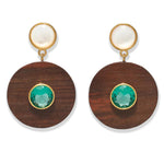 The Taj Disc Earrings by Lizzie Fortunato feature gold-plated brass, a white stud, a brown wooden circle, and a vivid green topaz centerpiece.