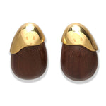 The Toro Earrings by Lizzie Fortunato feature oval-shaped acacia wood with dark brown bases and gold-plated brass caps, shown on a white background.