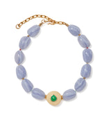 The Andalusia Collar by Lizzie Fortunato features light purple oval beads, gold spacers, an adjustable gold clasp, and a central round cream bead accented with green chrysoprase.