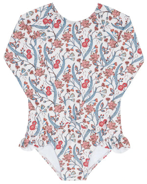 The Minnow Girls' Feathered Floral Rashguard One Piece is a sun-safe, long-sleeve swimsuit with a white base, red, blue, and pink floral print, plus delicate hip ruffles.