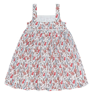 The Minnow Girls' Feathered Floral Square Neck Strap Dress features a sleeveless design, red and blue floral print, and a gathered full skirt.